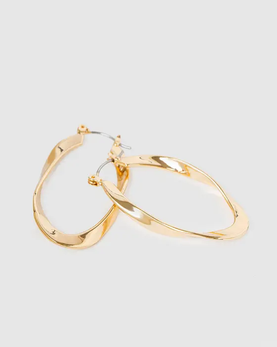 Gold Twisted Wave Hoop Earrings — view 3